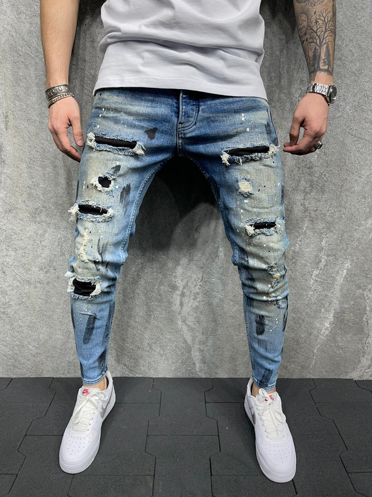 Vielseitige lässige, schlanke, zerrissene Herren jeans